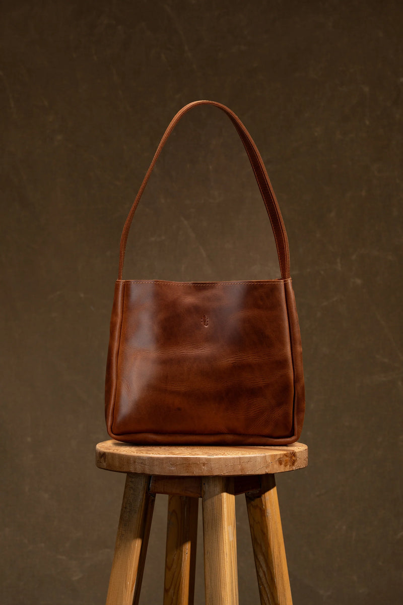 Leather shoulder bag with a long adjustable strap