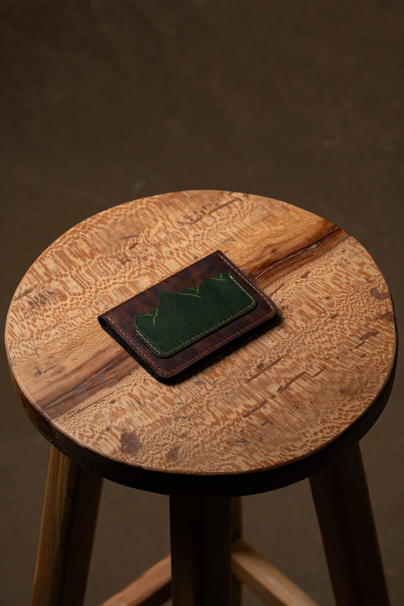 Slim leather card holder with a mountain pattern